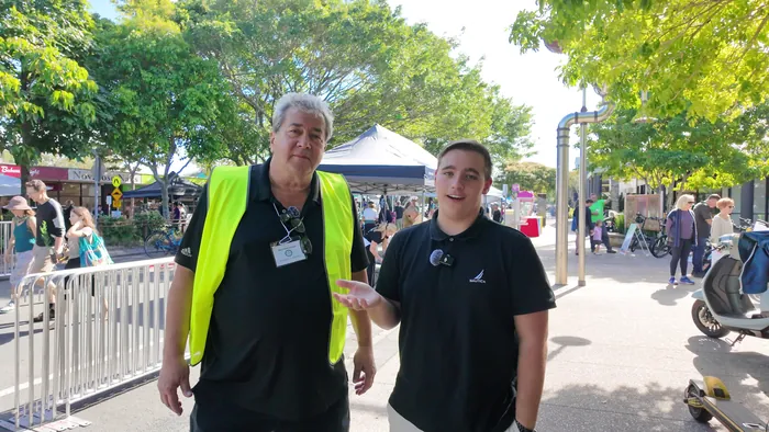 Adam thanking the owner of the Noosa EV Expo for a great event