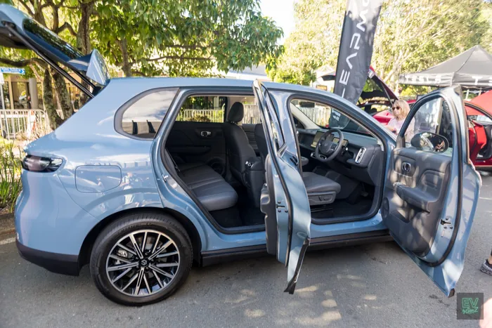 A Leap Motor EV with its doors open at the 2026 Noosa EV Expo