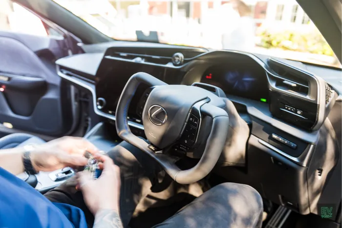 The futuristic yoke steering wheel of the Lexus RZ
